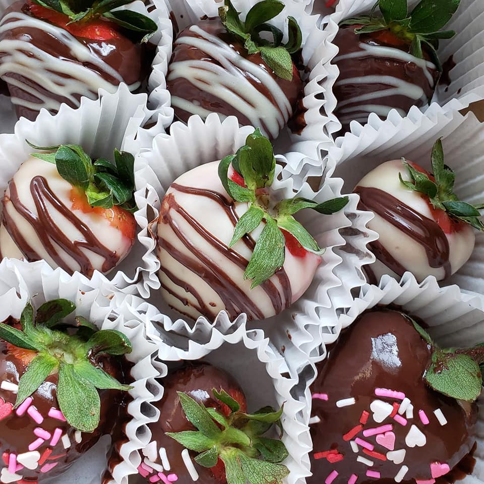 chocolate covered strawberries with heart sprinkles
